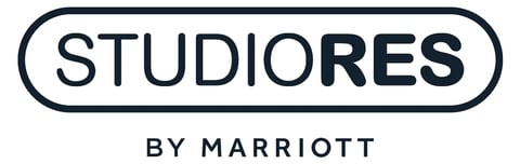 Studiores by Marriott logo in dark blue with rounded rectangular background